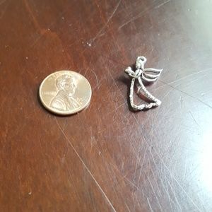 Silver Angel charm holding a heart